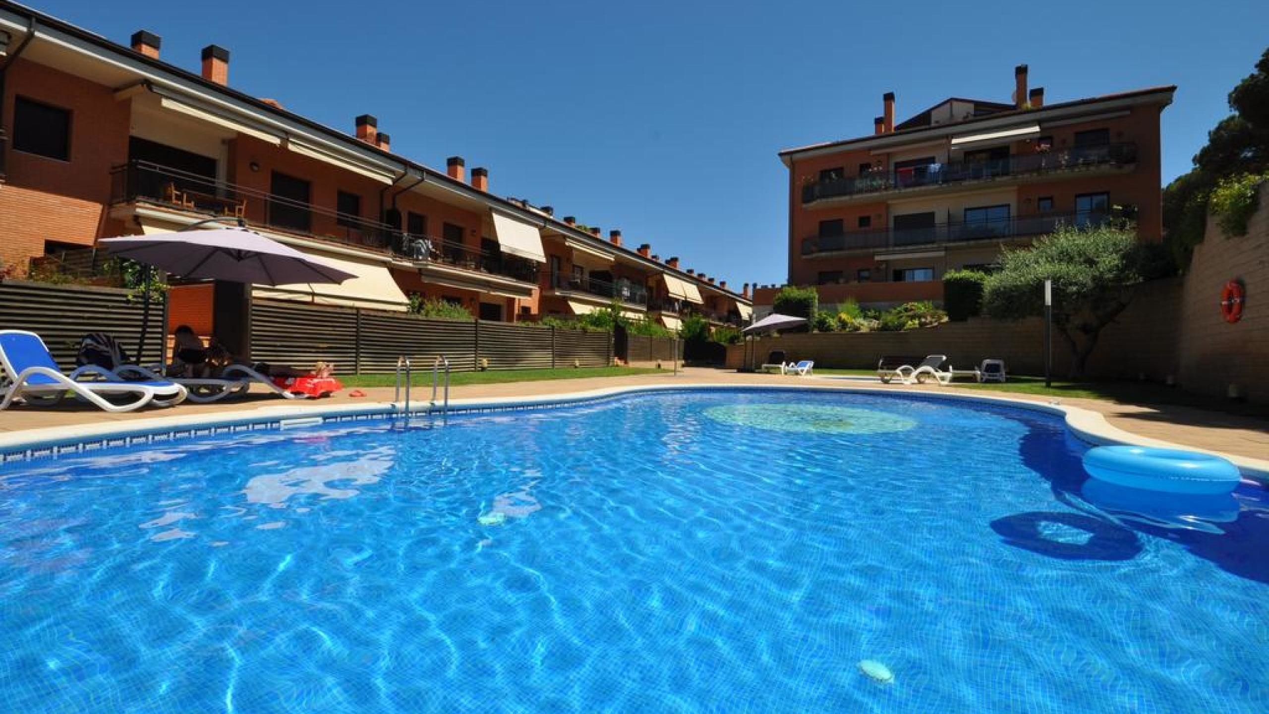 Vakantievilla's Costa Brava Spanje - Apartment Delylah - Gemeenschappelijk zwembad